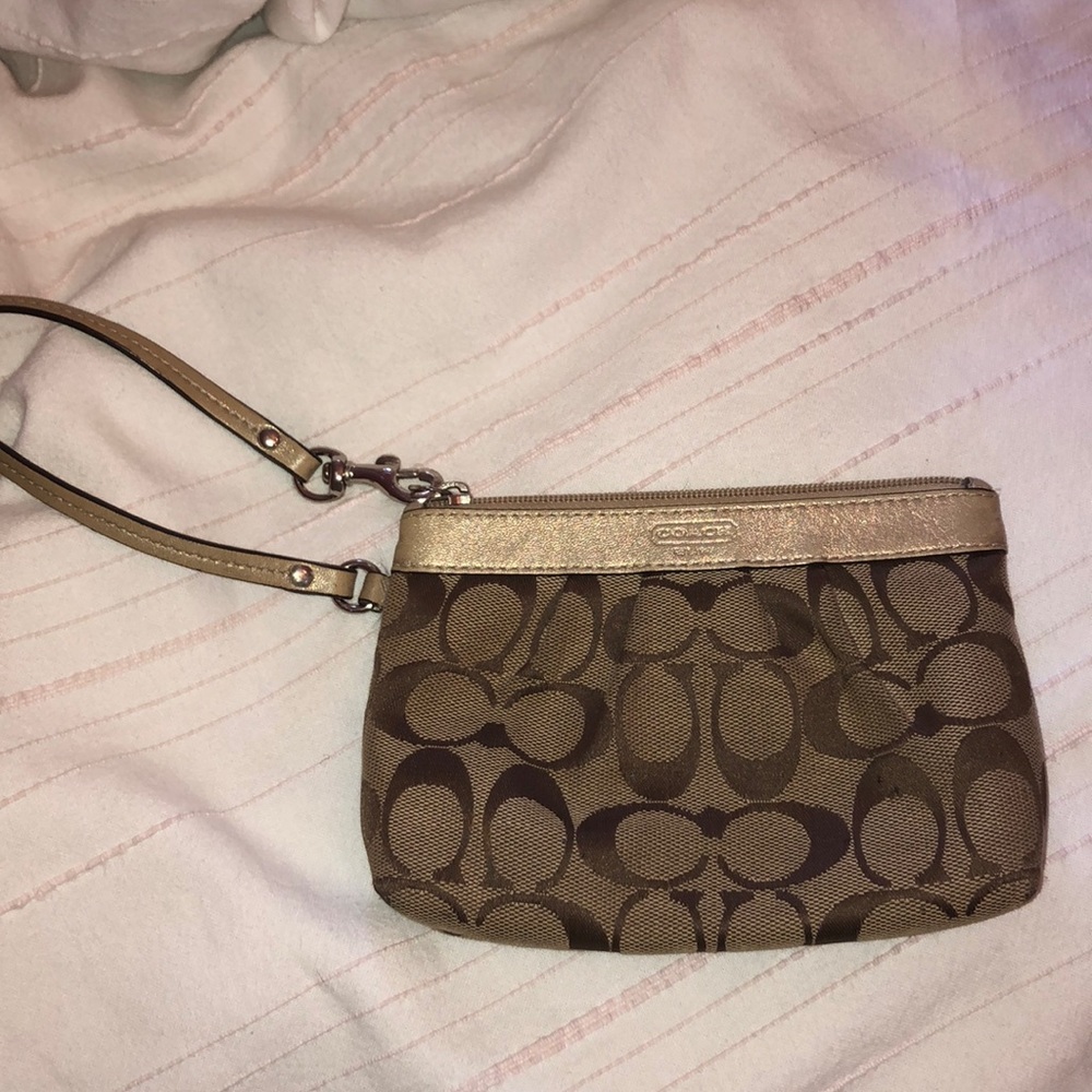 Gold and brown coach wristlet